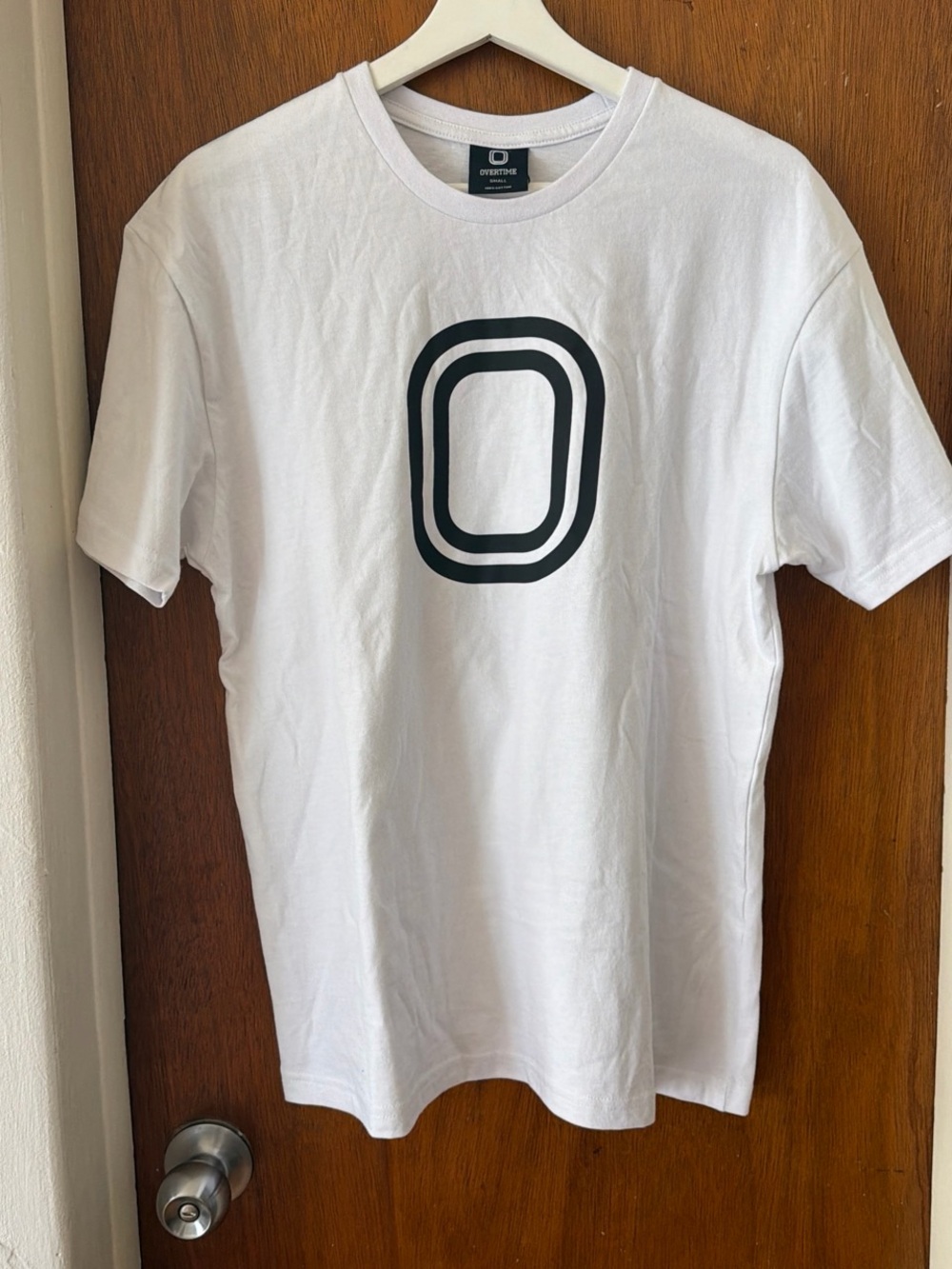 Oversized White Short-Sleeve Tee with Black Center Emblem